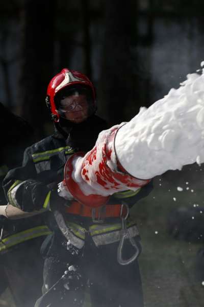 Belarus, Gomel, 04/06/2017, extinguishing forest fire.Belarus, Gomel, 04/06/2017, .Extinguishing the fire. Firemen are working. Fill the foam with a fire. Resolute firefighters. Fight fire
