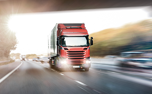 truck speeding down a road