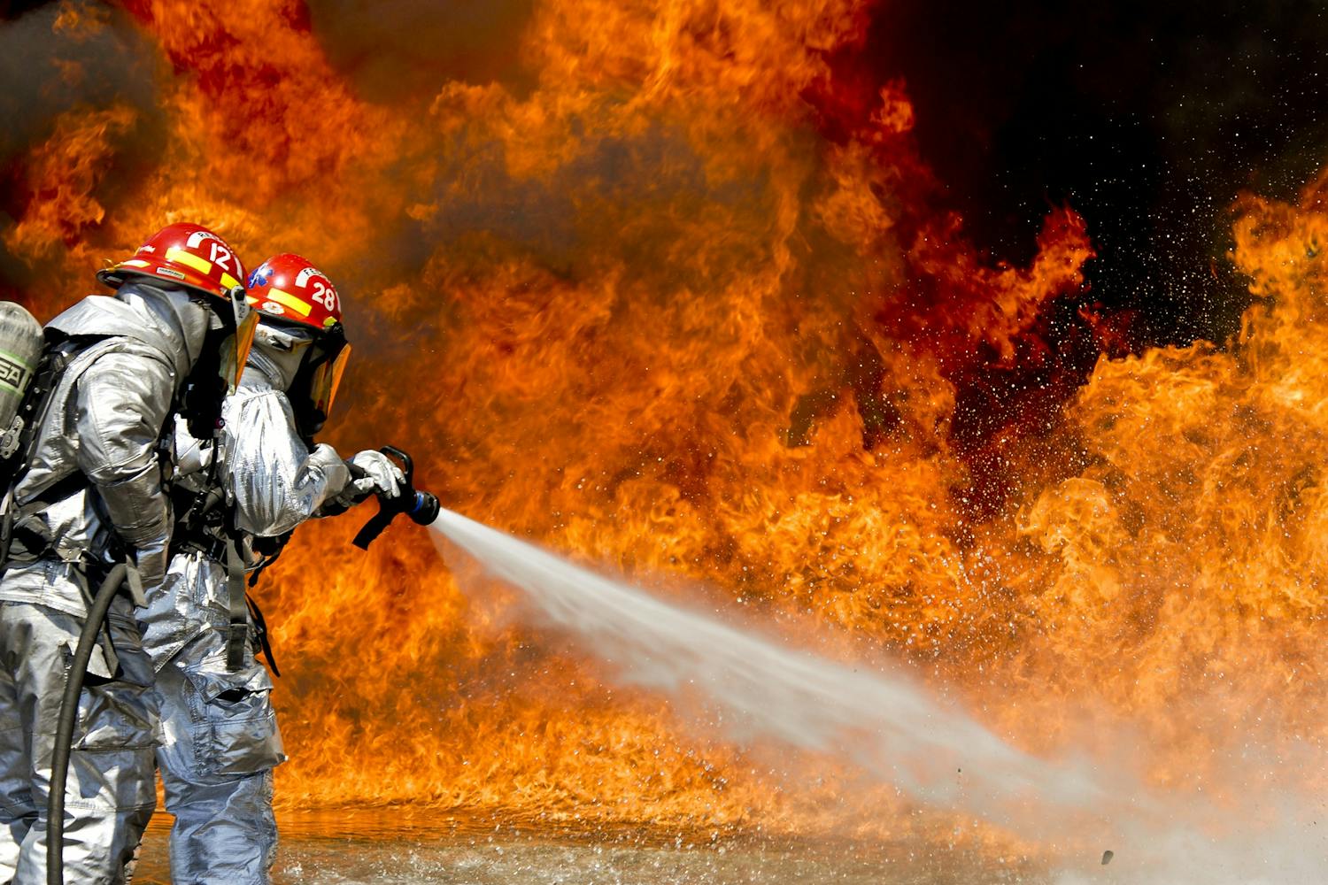 firefighters with foam
