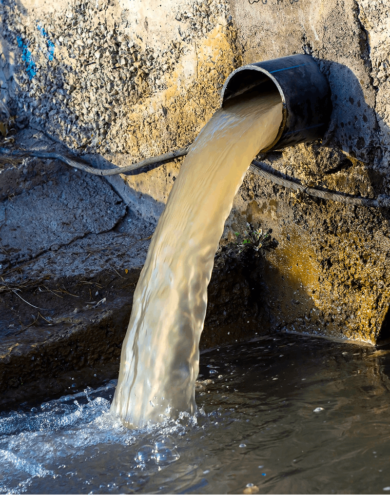 contaminated water supply coming out of a pipe
